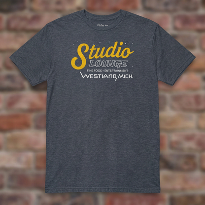 Studio Lounge Heather Navy T-shirt flat lay on brick background