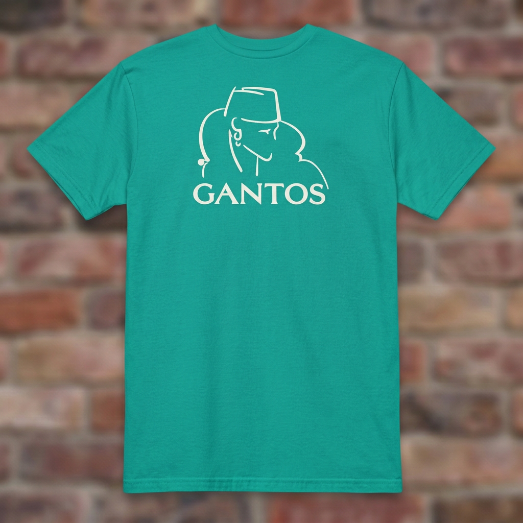 Gantos Jade Dome T-shirt flat lay on brick background