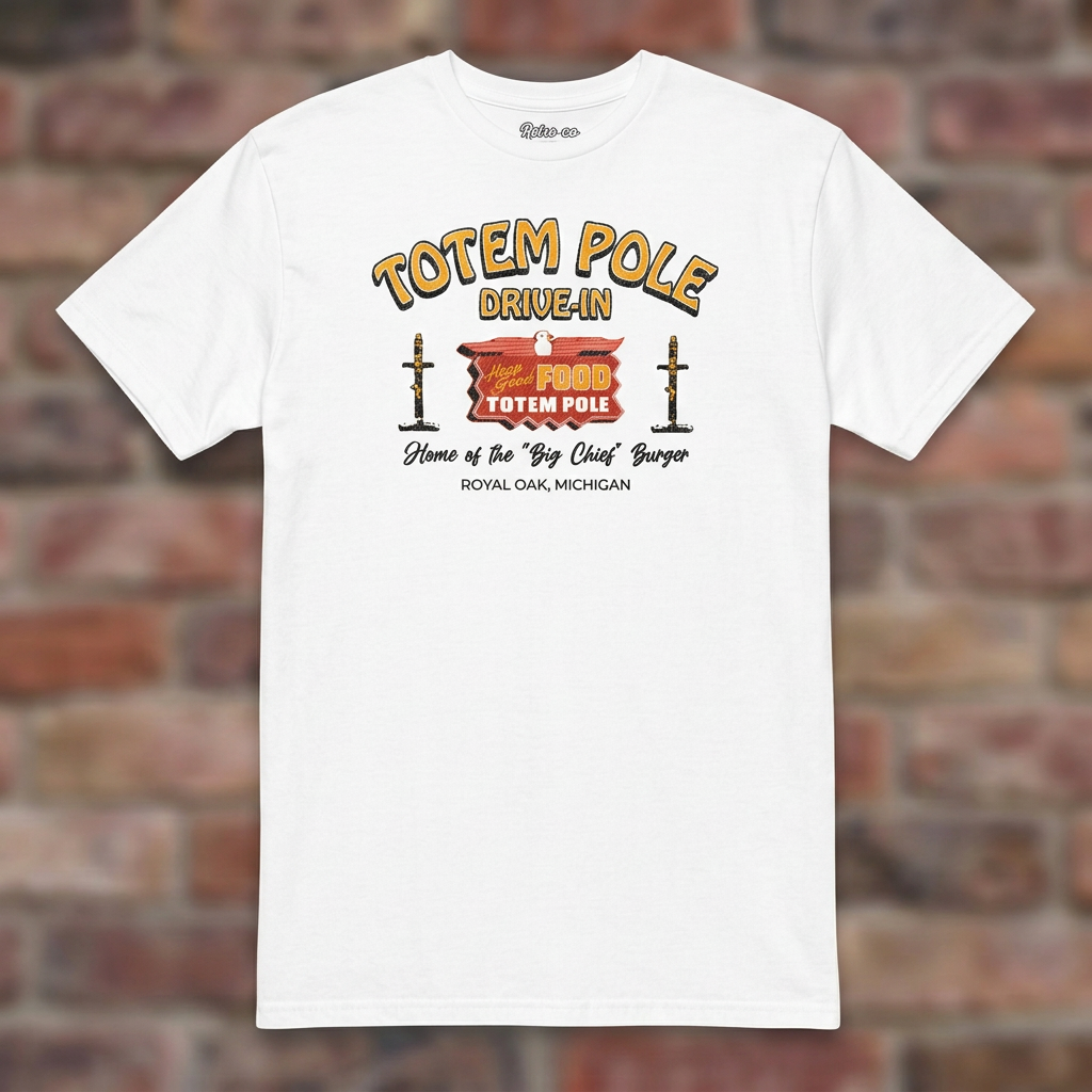 Totem Pole Drive-In White T-shirt flat lay on brick background