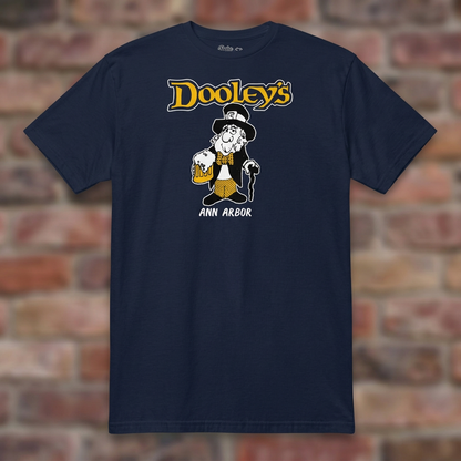 Dooley's Ann Arbor Navy T-shirt flat lay on brick background