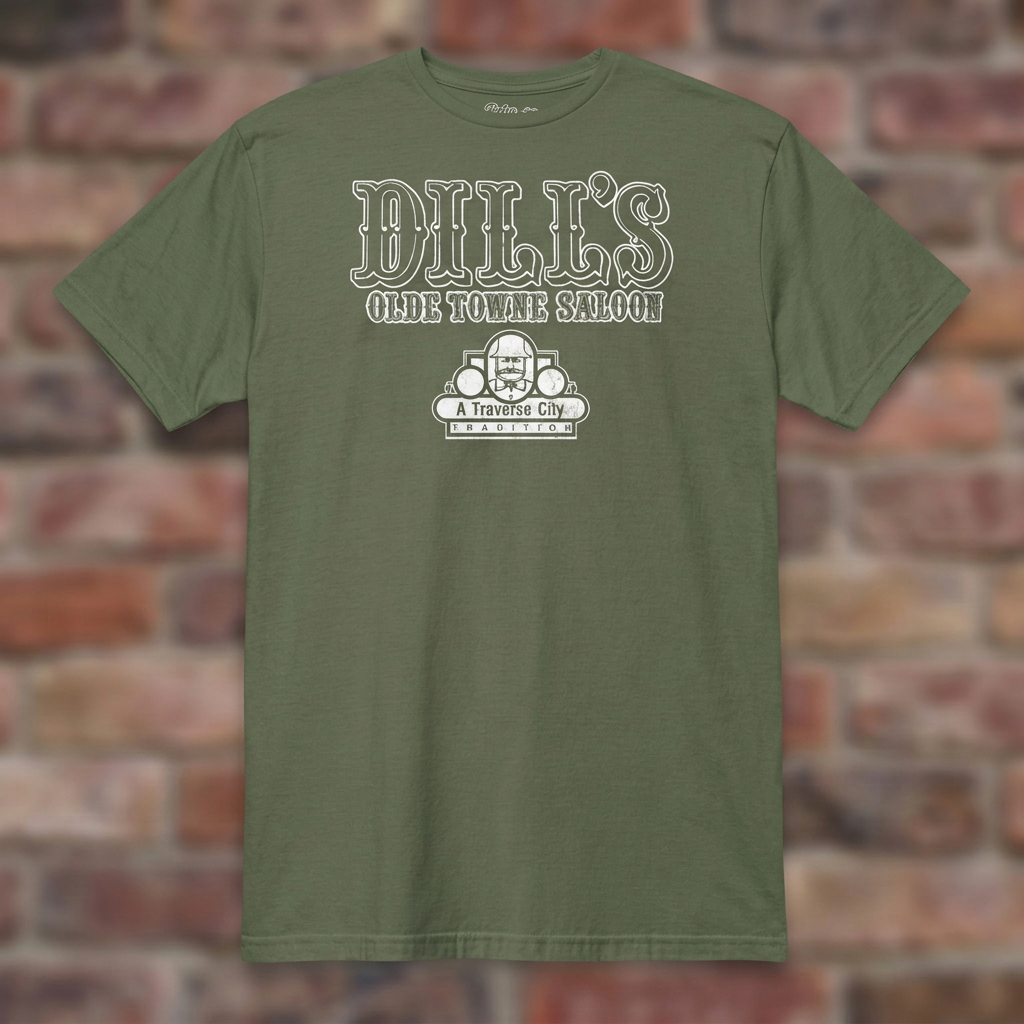 Dill’s Olde Towne Saloon Military Green T-shirt flat lay on brick background
