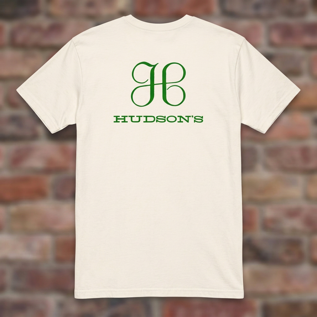 Hudson's Dept Store Detroit T-shirt in Natural, flat lay on warm brick background