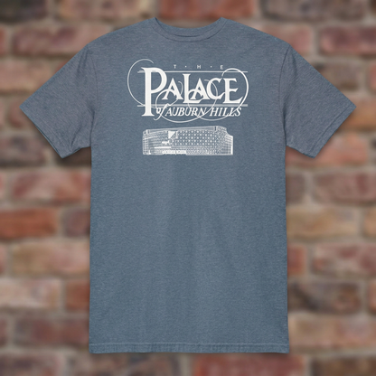 Heather Indigo Palace of Auburn Hills T-shirt flat lay on warm brick
