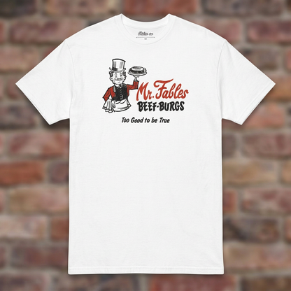 White Mr. Fables T-shirt flat lay on warm brick