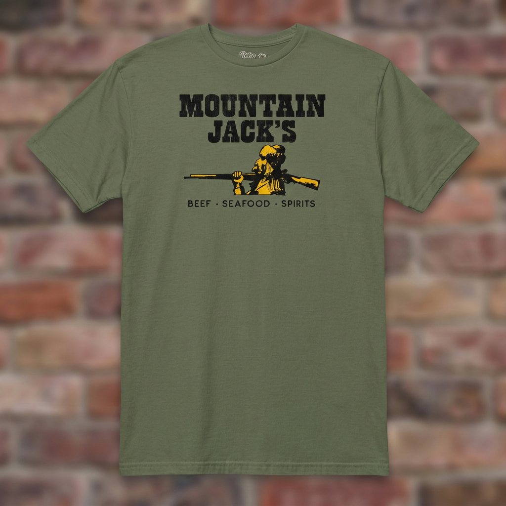 Mountain Jack's Military Green T-shirt flat lay on brick background