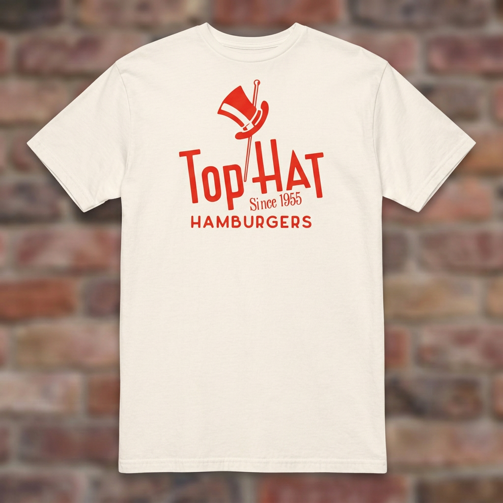 Top Hat Hamburgers Natural T-shirt flat lay on brick background