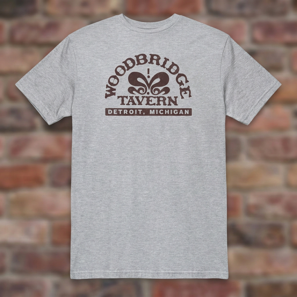 Woodbridge Tavern Sport Grey T-shirt flat lay on brick background