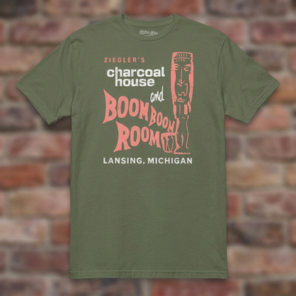 Ziegler's Military Green T-shirt flat lay on brick background