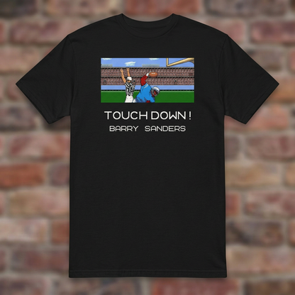 Touchdown Barry 8-Bit Black T-shirt flat lay on brick background