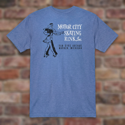 Motor City Skating Rink Heather Royal T-shirt flat lay on brick background