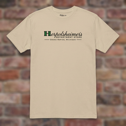 Herpolsheimer's Sand T-shirt flat lay on brick background