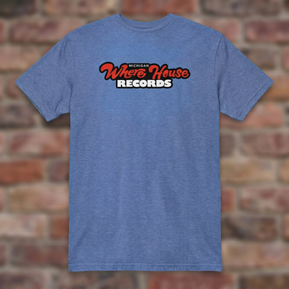 Wherehouse Records Michigan Heather Royal T-shirt flat lay on brick background