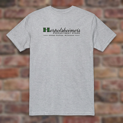 Herpolsheimer's Sport Grey T-shirt flat lay on brick background