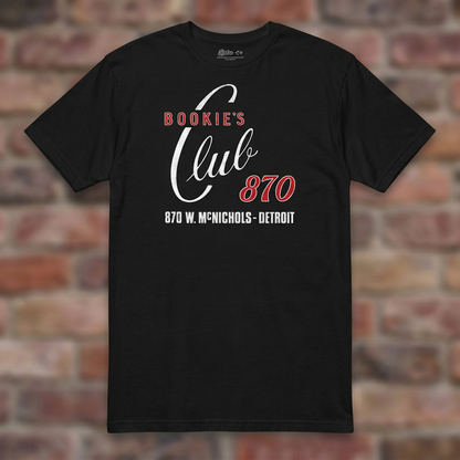 Bookie's Club 870 Detroit T-shirt in Black, flat lay on warm brick background