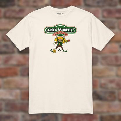 Carlos Murphy's Natural T-shirt flat lay on brick background