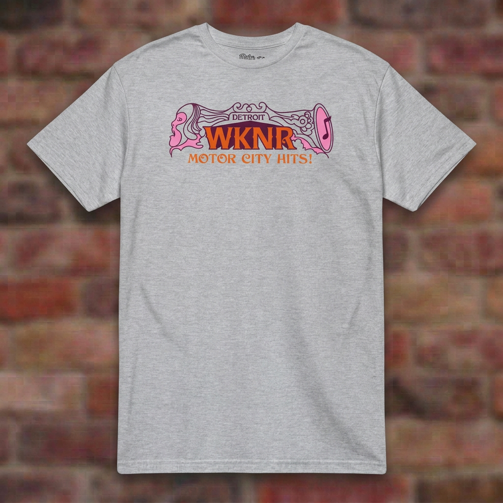 WKNR Radio Sport Grey T-shirt flat lay on brick background