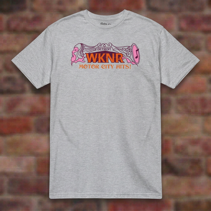 WKNR Radio Sport Grey T-shirt flat lay on brick background