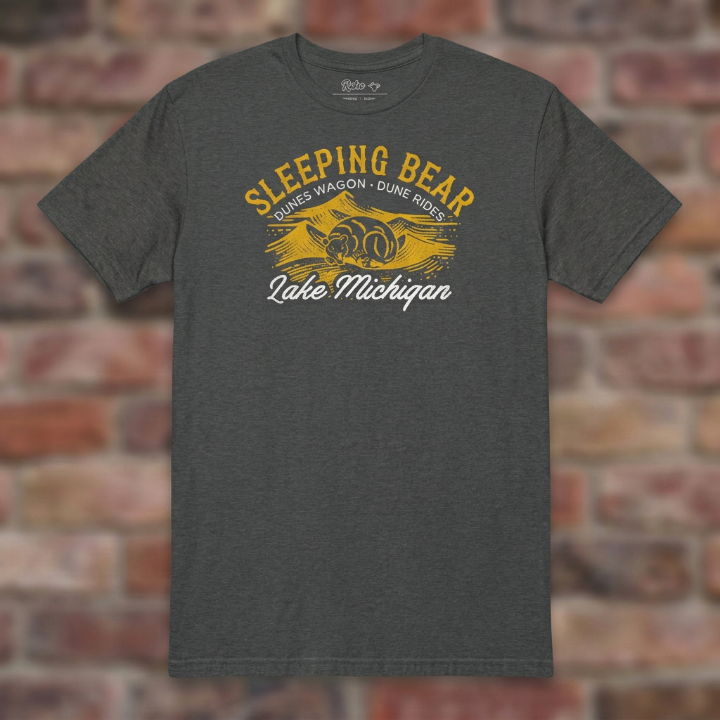 Sleeping Bear Dune Rides Dark Heather Grey T-shirt flat lay on brick background
