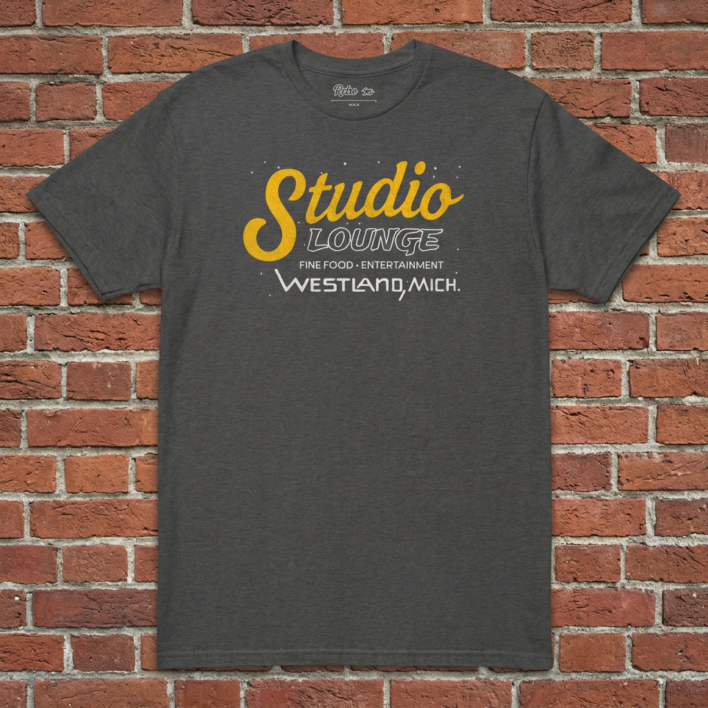 Studio Lounge Dark Heather Grey T-shirt flat lay on brick background