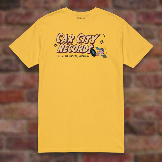 Car City Records Daisy T-shirt flat lay on brick background
