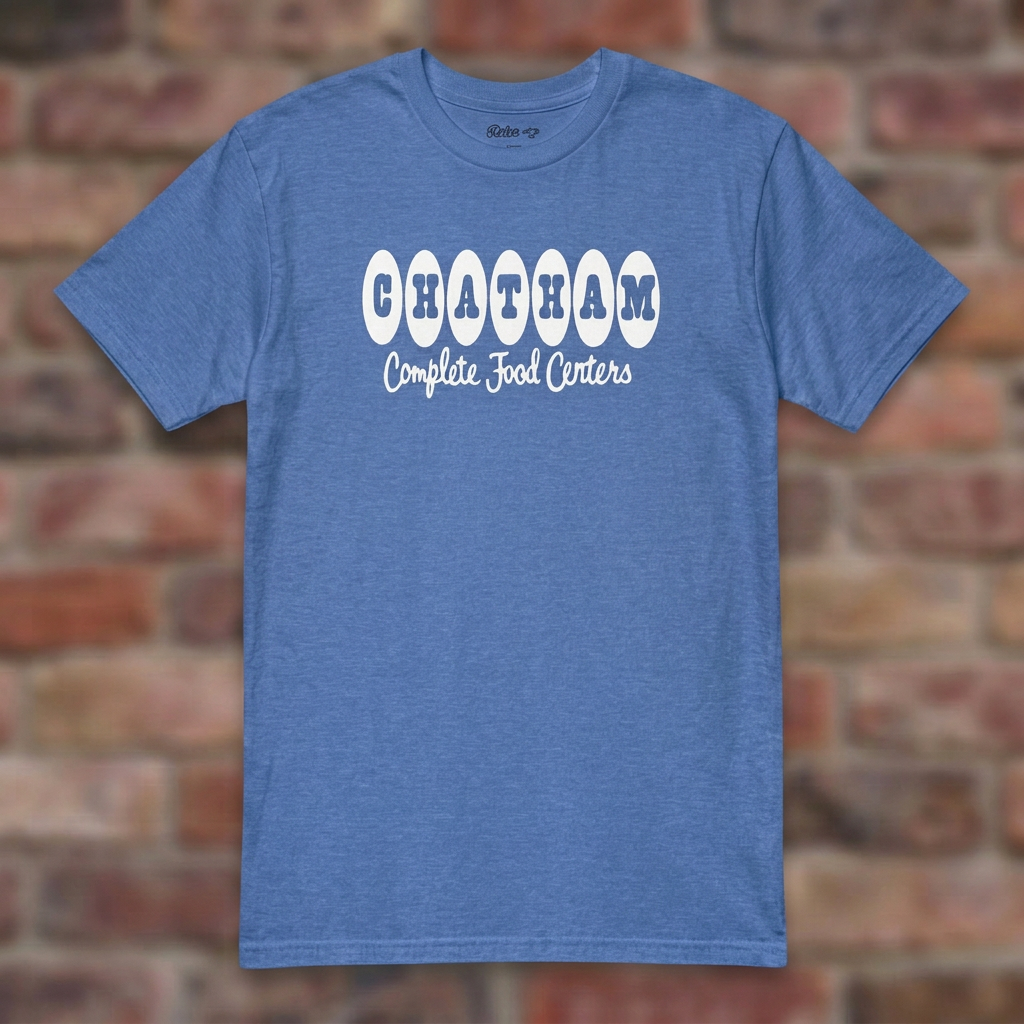 Chatham Heather Royal T-shirt flat lay on brick background