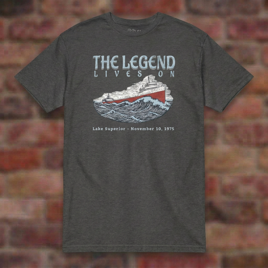 Dark Heather Grey Edmund Fitzgerald T-shirt flat lay on brick background, November 10, 1975