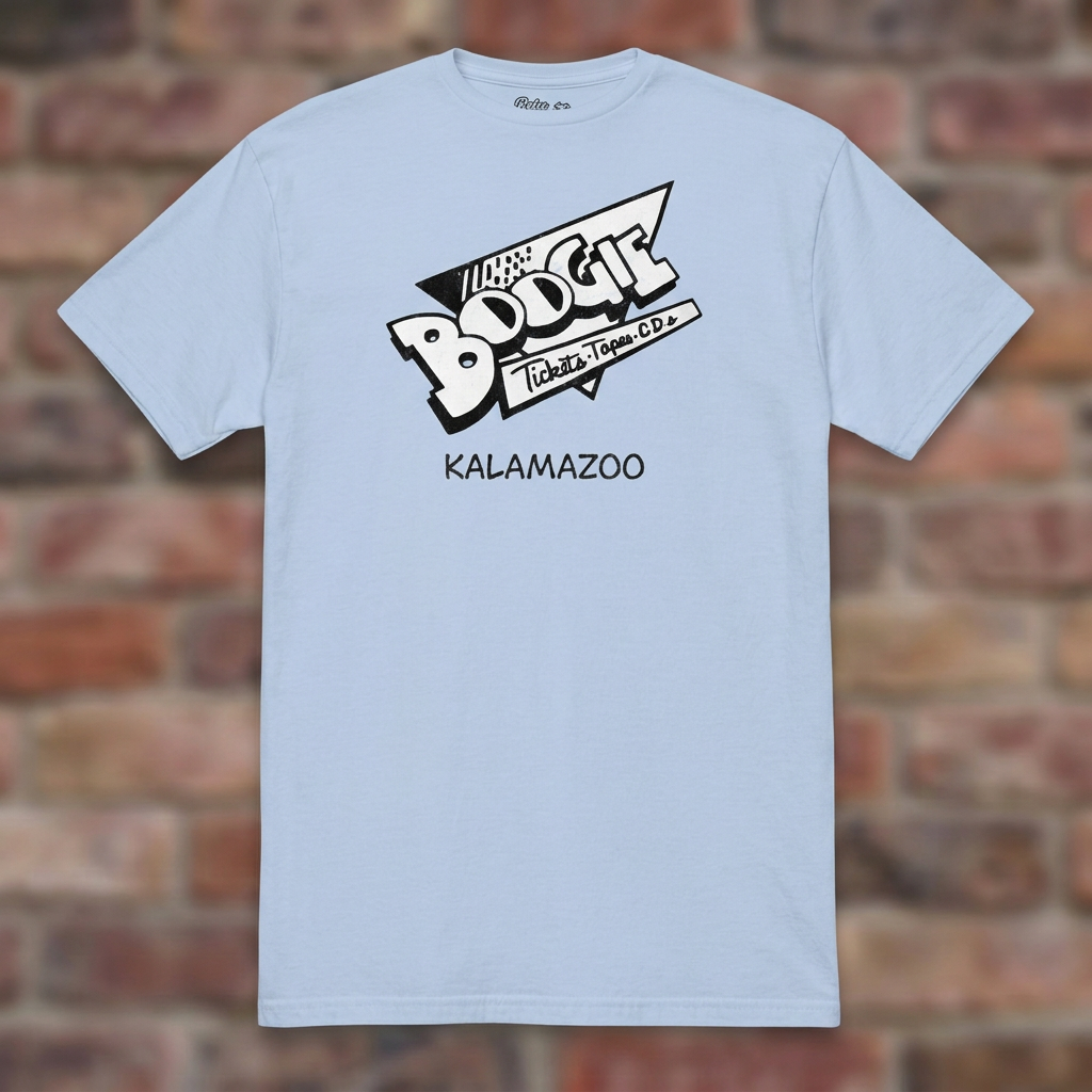Boogie Records Light Blue T-shirt flat lay on brick background