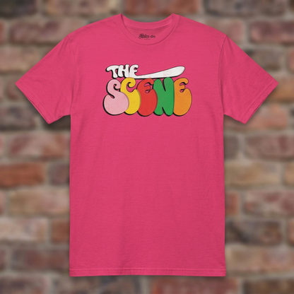 The Scene Detroit Heliconia T-shirt flat lay on brick background