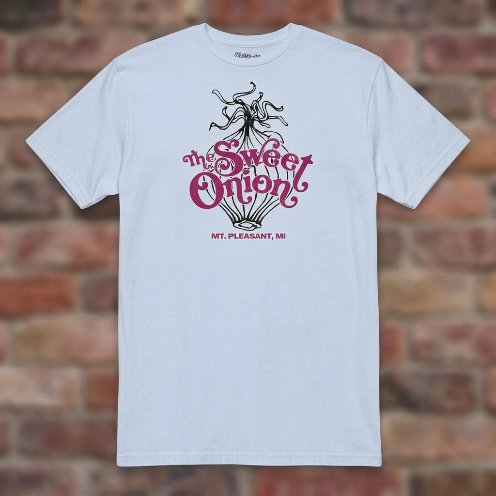 The Sweet Onion Light Blue T-shirt flat lay on brick background