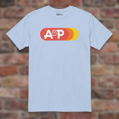 A&P Light Blue T-shirt flat lay on brick background