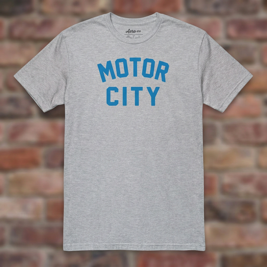 Sport Grey Motor City Classic T-shirt flat lay on warm brick
