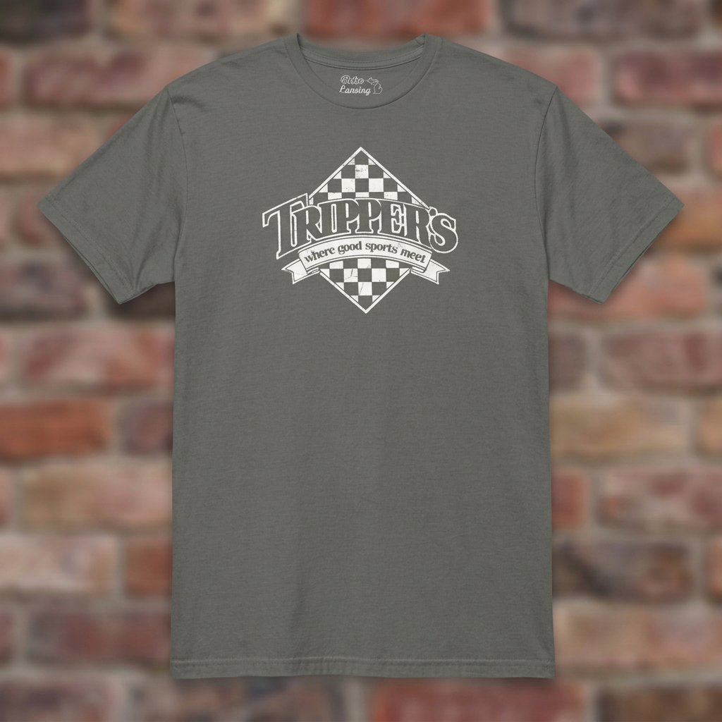 Trippers Lansing Charcoal T-shirt flat lay on brick background