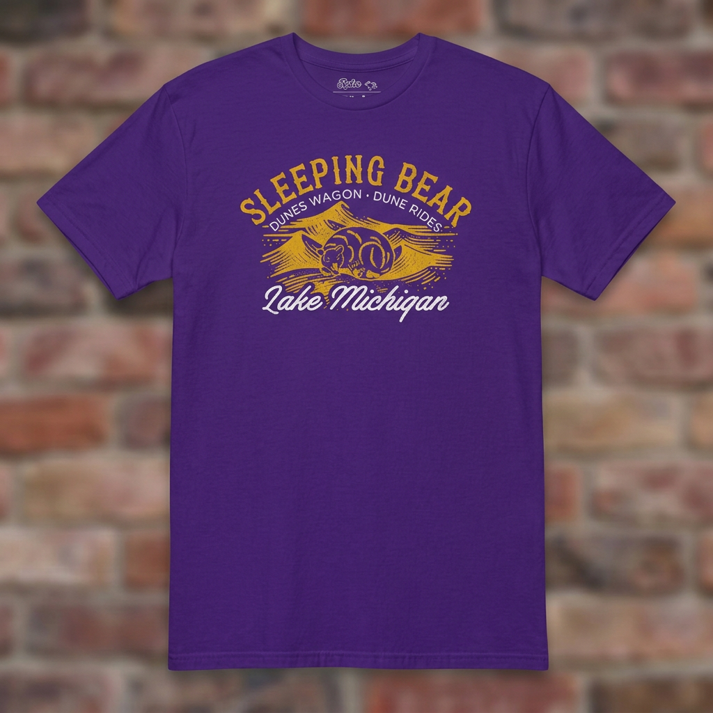 Sleeping Bear Dune Rides Purple T-shirt flat lay on brick background