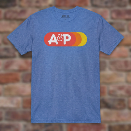 A&P Heather Royal T-shirt flat lay on brick background