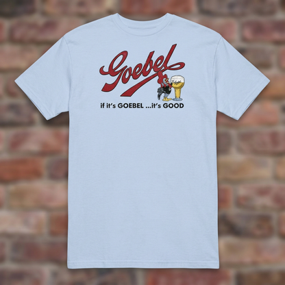Light Blue Goebel T-shirt flat lay on warm brick background