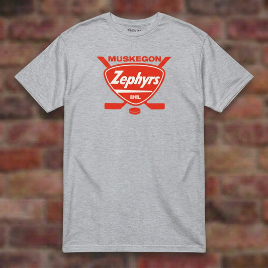 Muskegon Zephyrs Sport Grey T-shirt flat lay on brick background