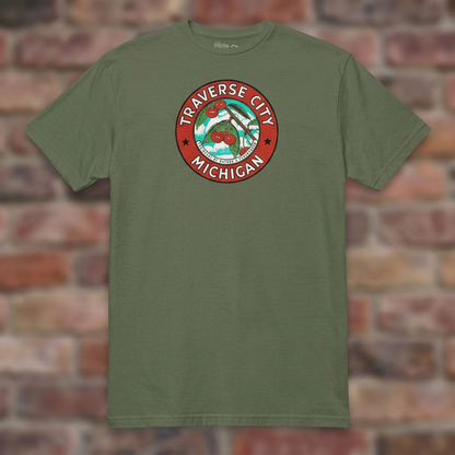 Traverse City Michigan Military Green T-shirt flat lay on brick background