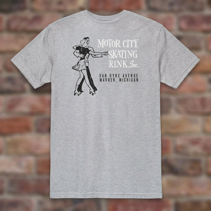 Motor City Skating Rink Sport Grey T-shirt flat lay on brick background