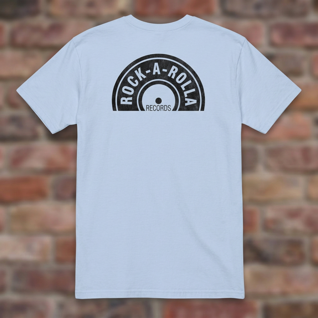 Rock-A-Rolla Records Light Blue T-shirt flat lay on brick background