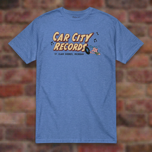 Car City Records Heather Royal T-shirt flat lay on brick background