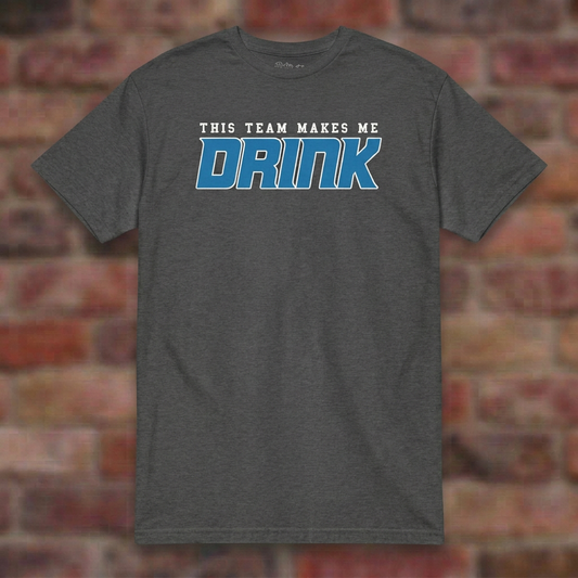This Team Makes Me Drink Detroit Football Dark Heather Grey T-shirt flat lay on brick background