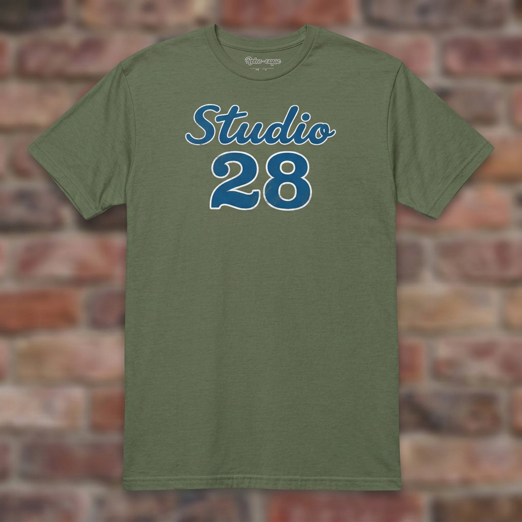 Studio 28 Military Green T-shirt flat lay on brick background