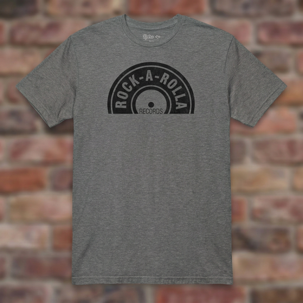 Rock-A-Rolla Records Graphite Heather T-shirt flat lay on brick background