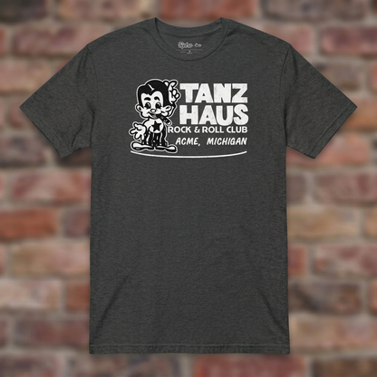Tanz Haus Dark Heather Grey T-shirt flat lay on warm brick