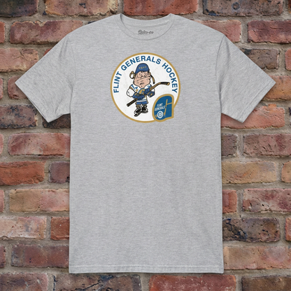 Flint Generals Hockey T-shirt in Sport Grey, flat lay on warm brick background
