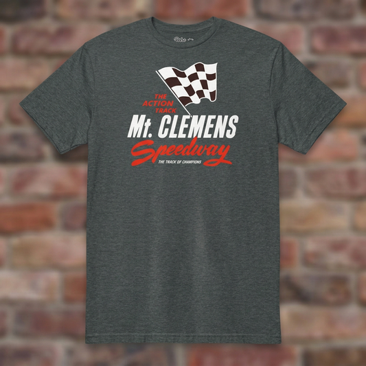 Mt. Clemens Speedway Dark Heather T-shirt flat lay on weathered brick background