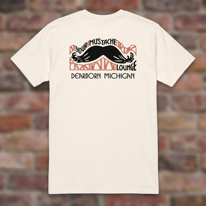 Your Mustache Lounge Dearborn Natural T-shirt flat lay on brick background