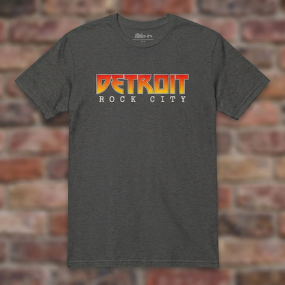 Detroit Rock City Dark Heather Grey T-shirt flat lay on warm brick