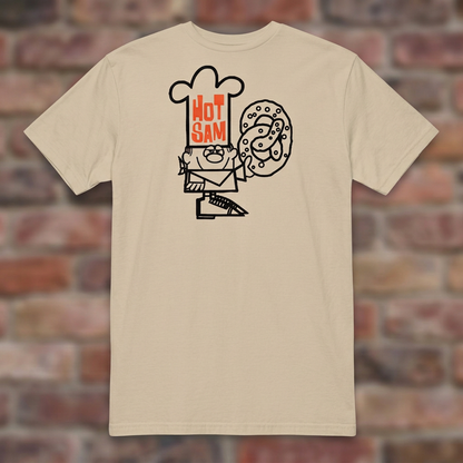 Hot Sam Pretzels T-shirt in Sand, flat lay on warm brick background