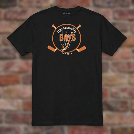 Traverse City Bays Hockey Black T-shirt flat lay on brick background